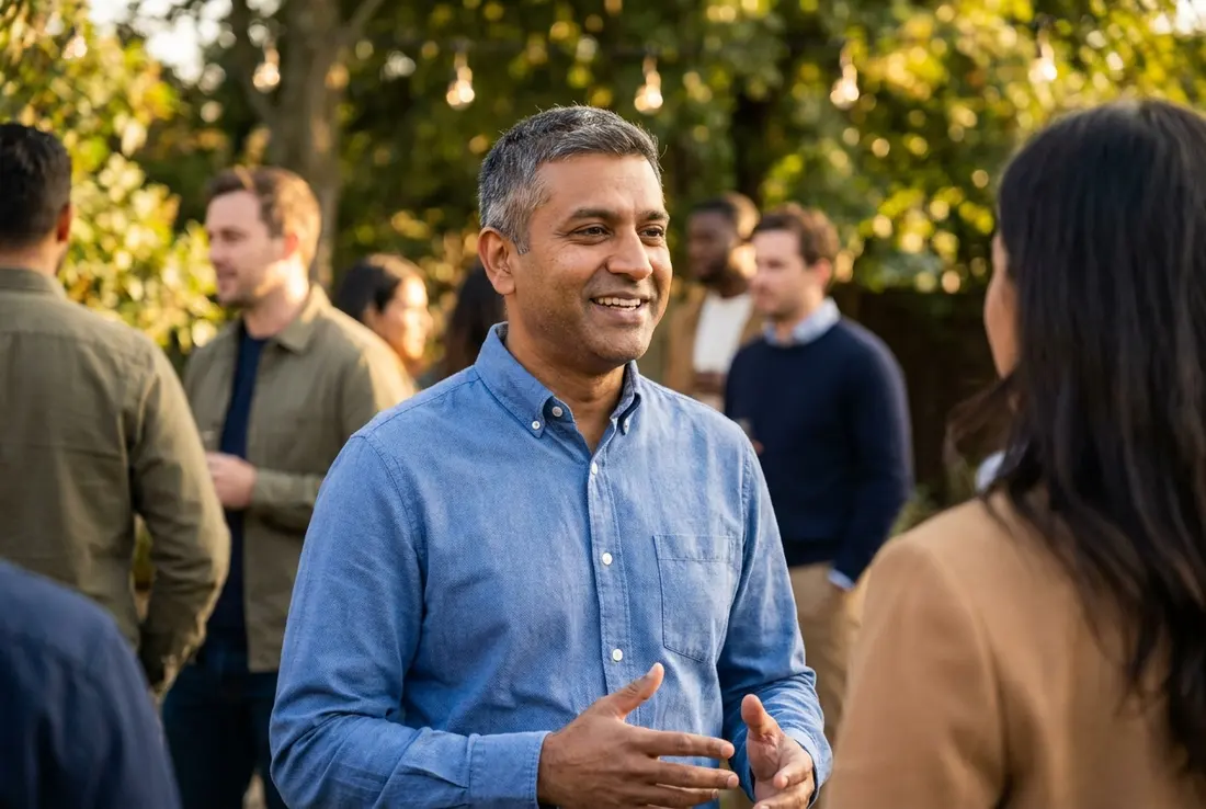 Generated image of Raj Patel with the team at a social gathering